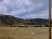 A ranch with mountains in the background