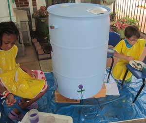 painting a rain barrel